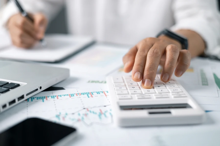a person using calculator at work