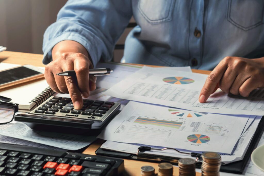 A person using calculator in office